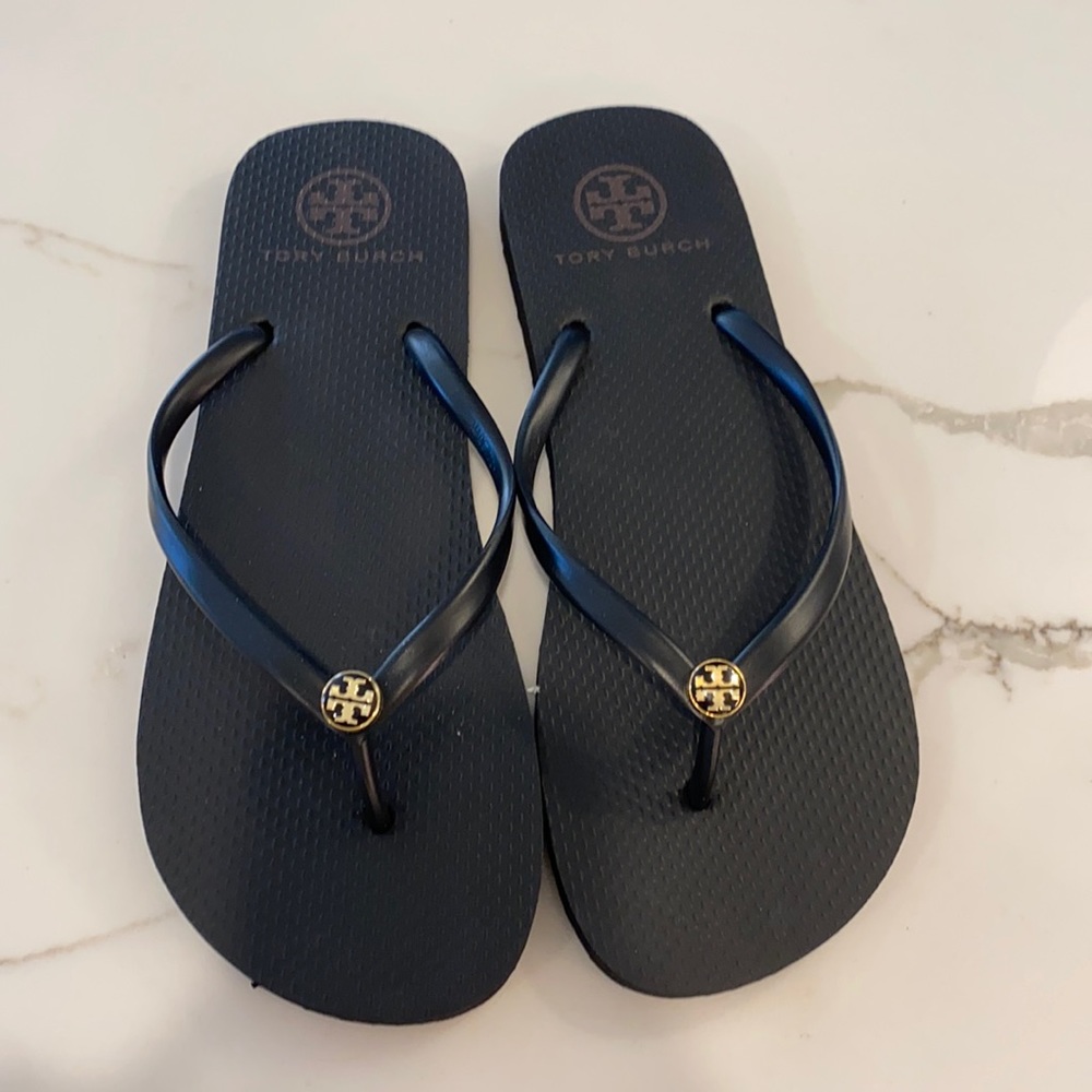 Tory Burch thin flip flops. Never worn. Size 9